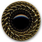 Bouton métallisé vieil or avec centre noir en 36 mm
